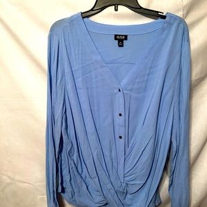 Light blue long sleeve blouse.